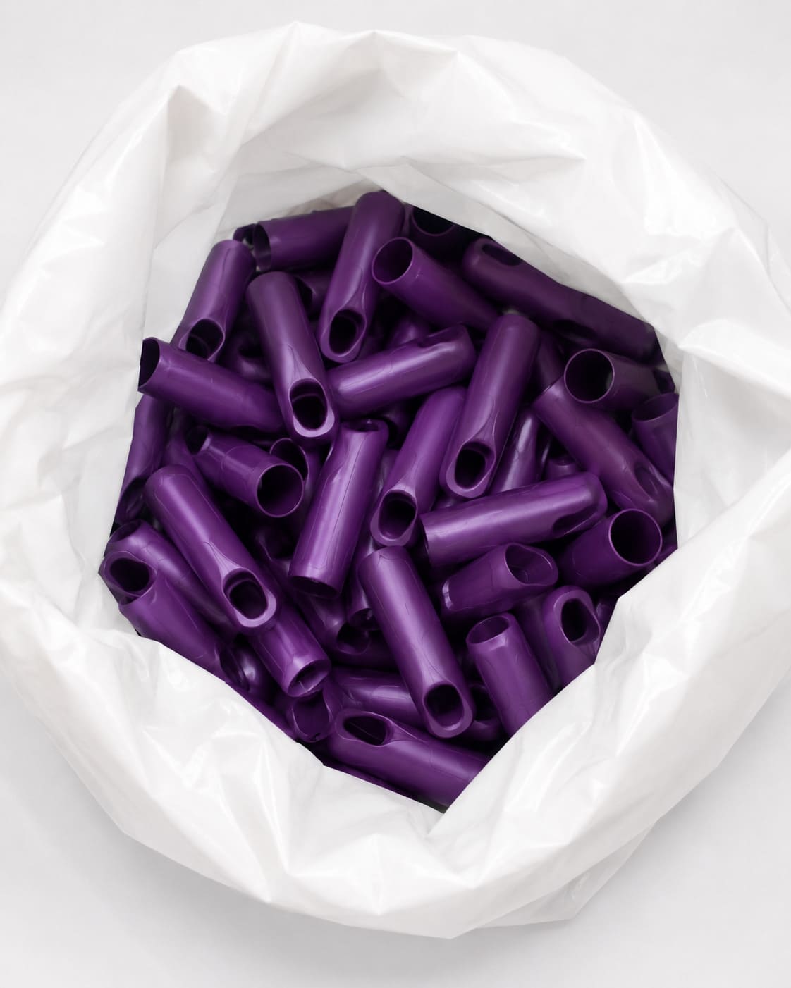 Purple metal handles packed in bags